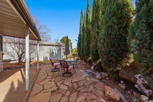View of patio with outdoor dining area