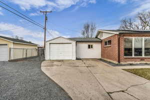 Garage with concrete driveway