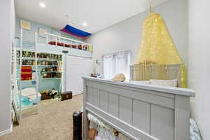 Carpeted bedroom featuring recessed lighting