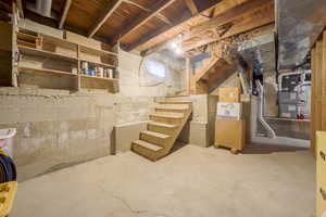 Unfinished basement with stairs