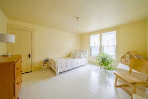 Bedroom featuring light wood-style floors