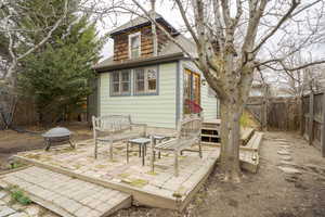 View of outbuilding featuring a fenced backyard