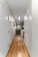 Hallway to laundry room. The door on the left leads to the garage.