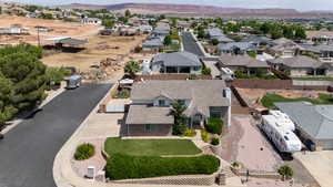 Aerial view of residential area with a mountain backdrop