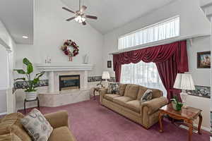 Large and open formal living room with fireplace.