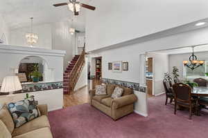 Formal living room looking into the formal dining room and back toward the front entry.