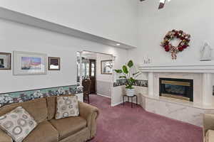 Large and open formal living room connects to the formal dining room.