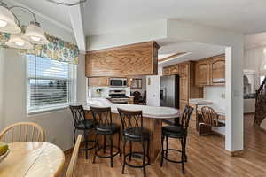 Dining nook and breakfast bar area.