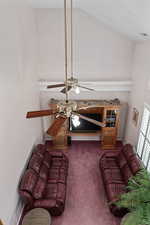 View looking down on living/tv room from upstairs landing.