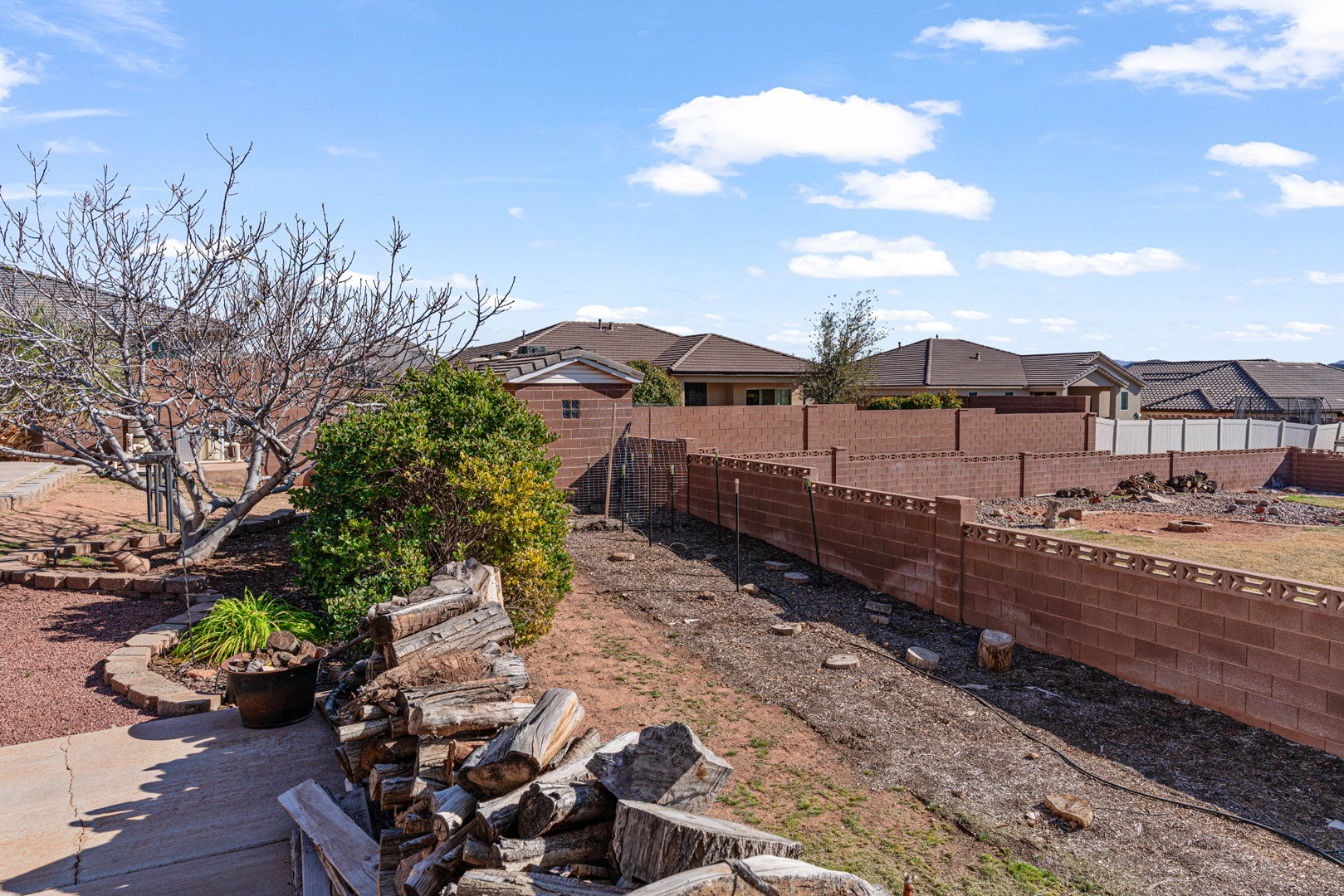 Fenced backyard with room for animals