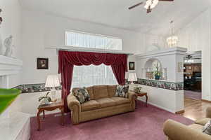Formal living room area and front entry and office.