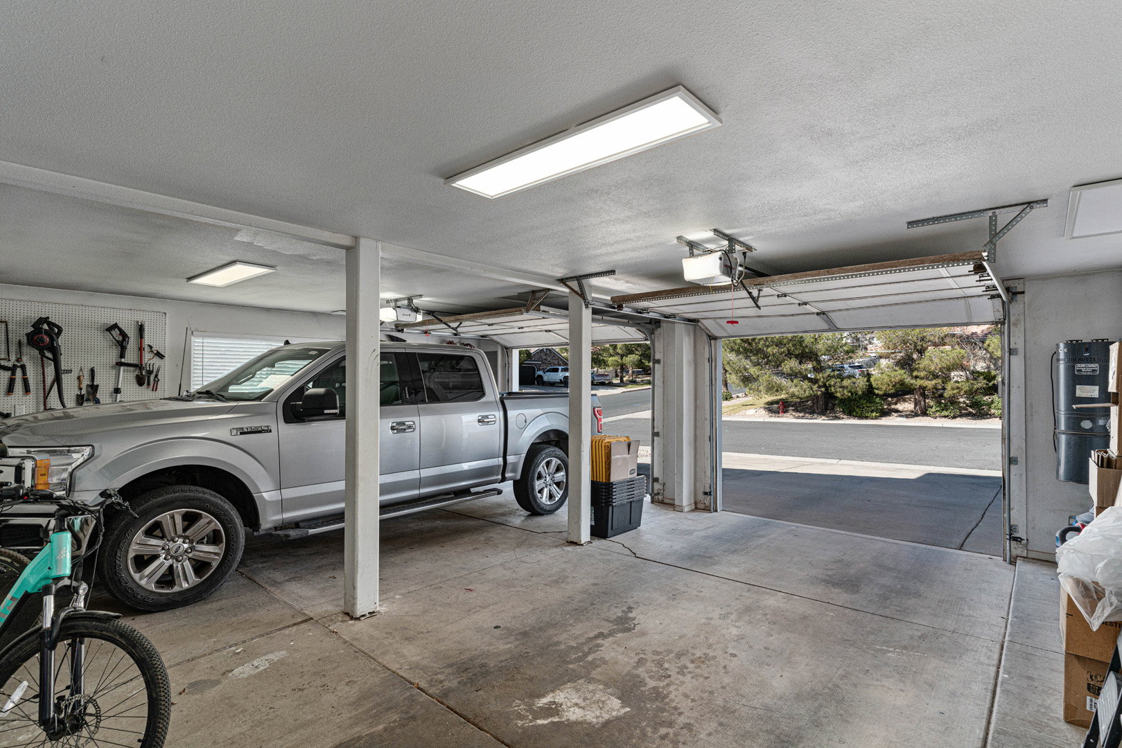 Large 2-car garage with enough room for a full-sized truck.