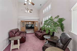 Large living/tv room right off the kitchen area. Large windows that face the backyard (east) let in plenty of natural light.