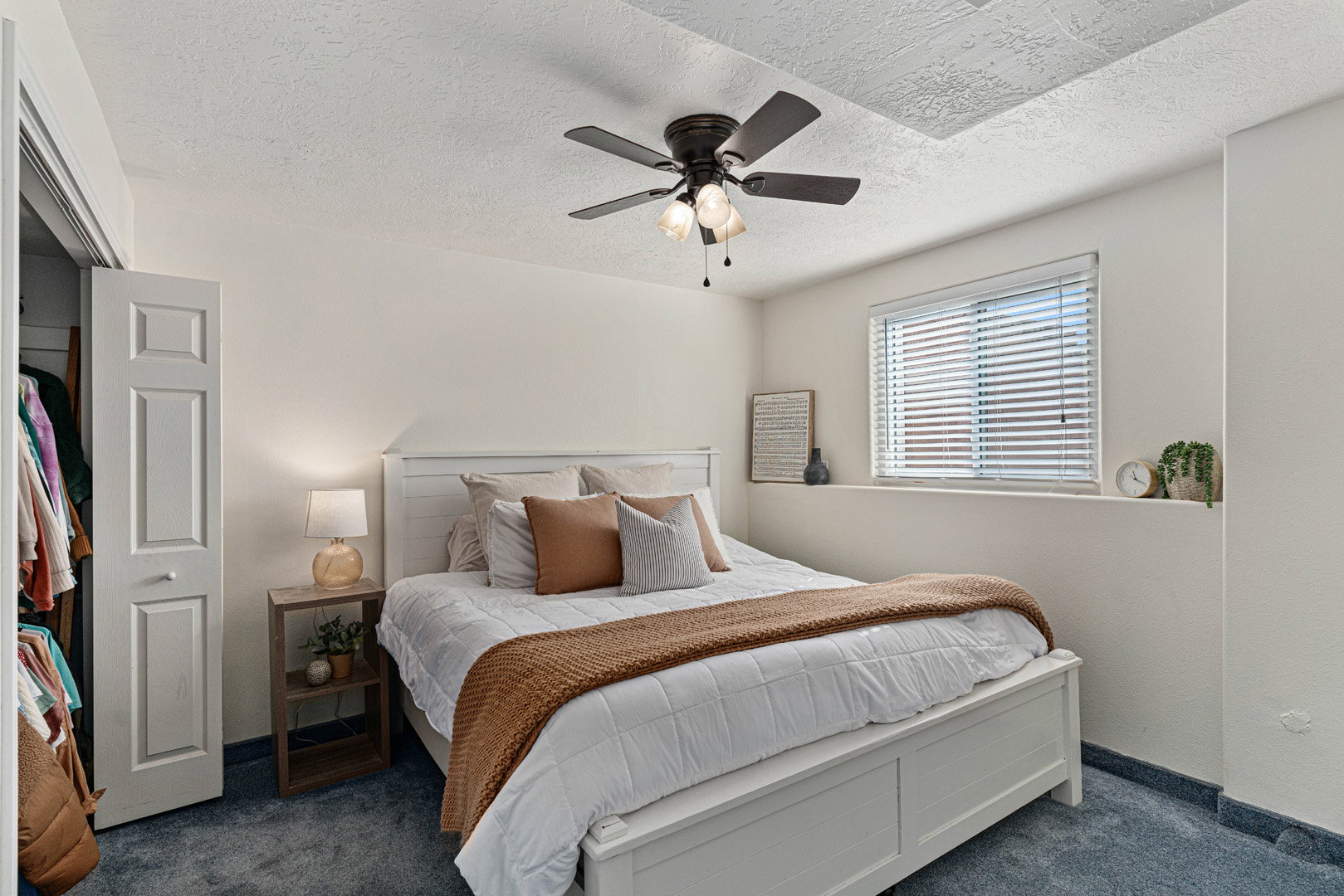 Large downstairs bedroom that fits a king-sized bed.
