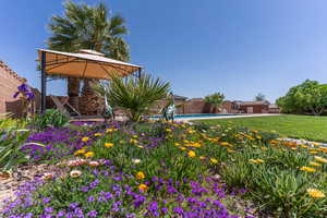 View of yard with an outdoor pool