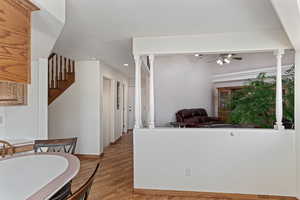 Dining nook area looking into family/tv room.