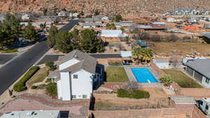 Aerial view of residential area featuring the large backyard and pool