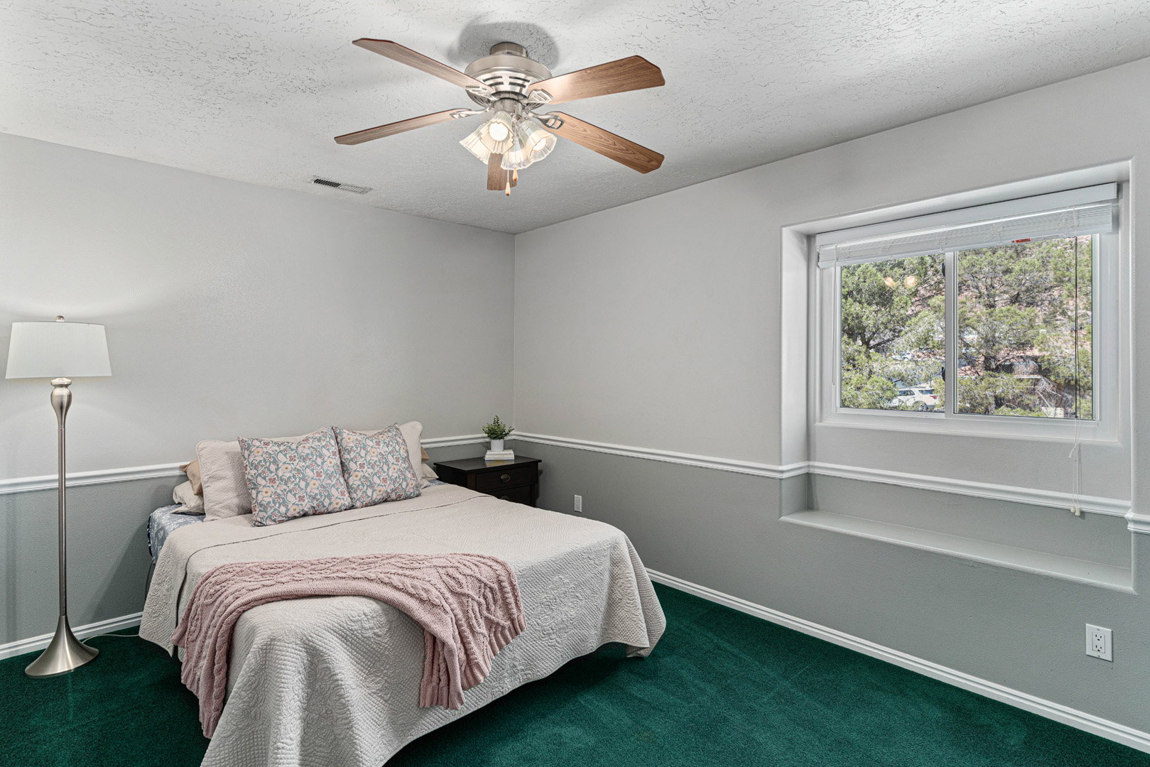 Large bedroom at the end of the hall with window facing the north. This room has a large walk-in closet.