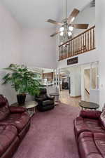 Looking back toward kitchen and upstairs landing.