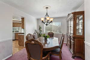 Formal dining area off the formal living room and is connected to the kitchen.