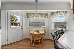 Dining nook and breakfast bar area next to the back patio door.