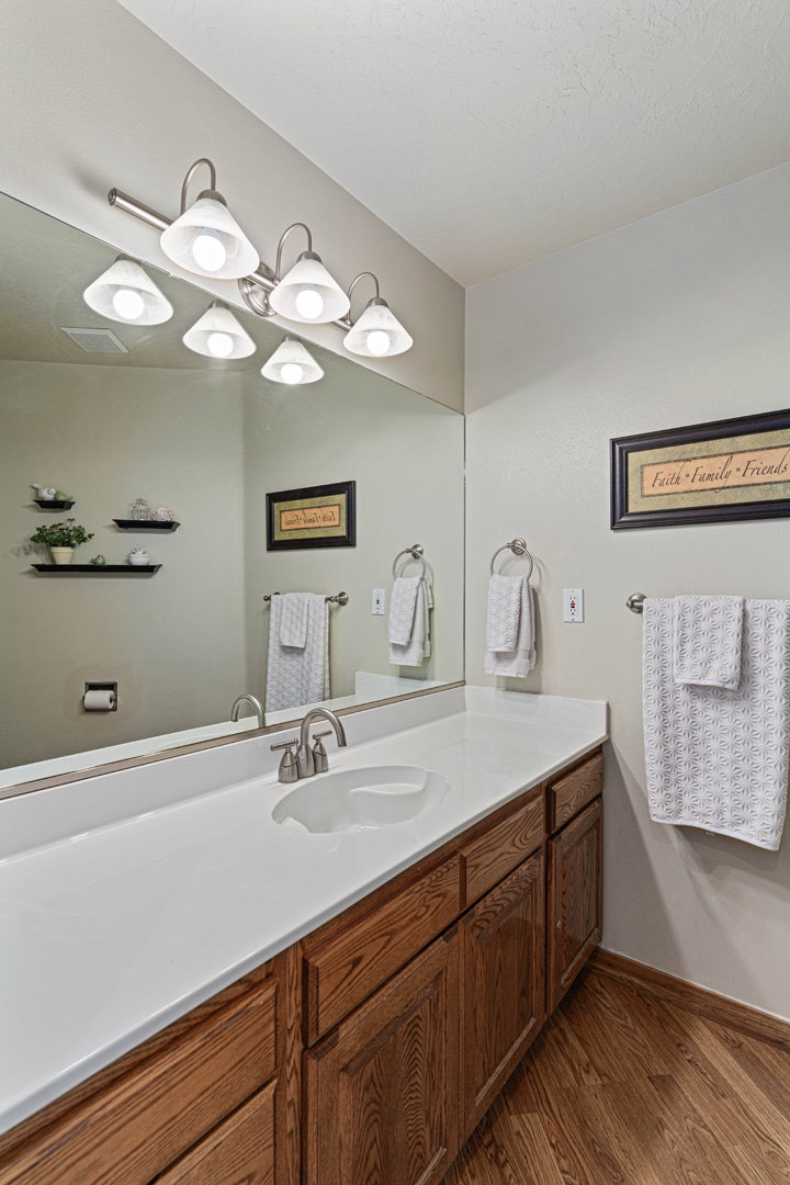 Powder bathroom located just off the living/tv room.