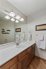 Powder bathroom located just off the living/tv room.