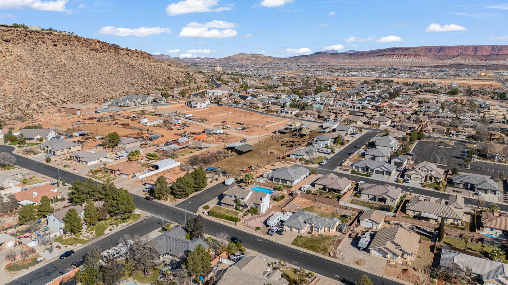 Aerial view with a mountain backdrop