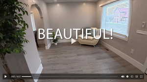 Sitting room featuring arched walkways, wood finished floors, and recessed lighting