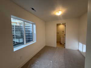Fourth bedroom, in the basement with ensuite bathroom and walk in closet.