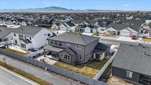 Aerial view of residential area featuring mountains