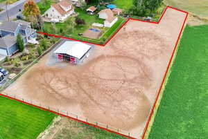 Aerial overview of property's location with property parcel outlined