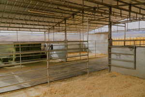 Horse barn featuring a mountain view