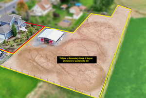 Aerial view of property and surrounding area with property parcel outlined