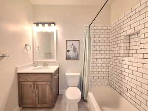Full bath with vanity and shower / bathtub combination with curtain