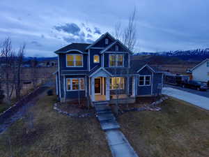 View of front of house with a yard