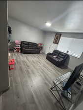 Living area featuring wood finished floors