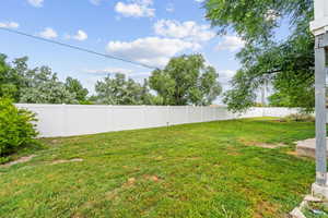 View of fenced backyard