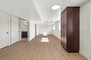 Hardwood throughout the basement area