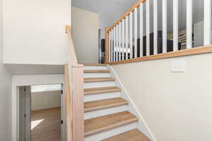 Staircase with wood finished floors