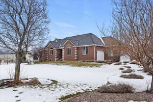 View of front of home with brick siding