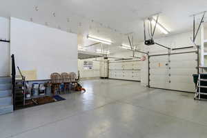 Garage featuring a garage door opener