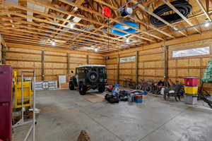 Garage featuring a garage door opener