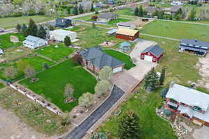 Aerial overview of property's location featuring nearby suburban area