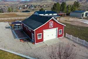 View of barn featuring a mountain view