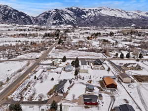 View of mountain background featuring nearby suburban area