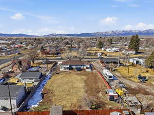 Aerial view of residential area with mountains
