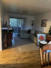Living area with wood finished floors