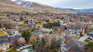 Aerial view of residential area with a mountainous background