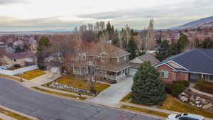 Aerial view of residential area with a mountainous background